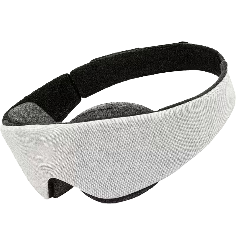 The Eclipse Mask — black contoured sleep mask on cream background